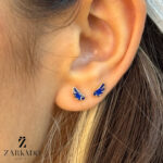 گوشواره میخی طلا طرح بال فرشته آبی کد E5572