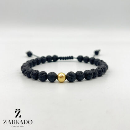 دستبند سنگی مشکی با گوی طلا