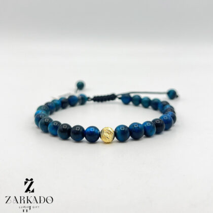 دستبند سنگی آبی با گوی تراشدار طلا