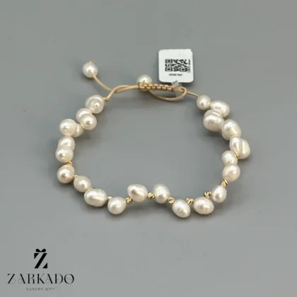 دستبند طلا و مروارید پرورشی گندمی و گوی البرنادو