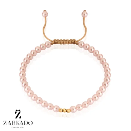 دستبند مرواریدی طلا و گوی البرنادو پیوسته با مروارید صورتی