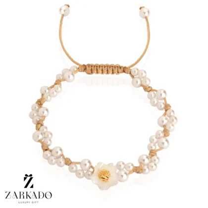 دستبند طلا و مروارید با صدف گل و گوی چکشی