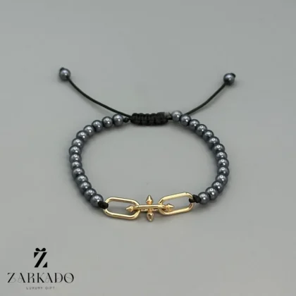 دستبند مرواریدی و پلاک طلا تیفانی تایتان