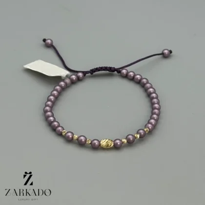 دستبند مرواریدی و گوی البرنادو طلا با مروارید مات