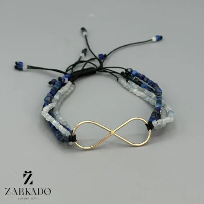 دستبند سنگی و طلا طرح بینهایت با سنگ چندرج