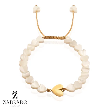 دستبند سنگ صدف طرح ونکلیف با پلاک قلب طلا