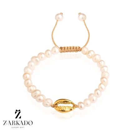 دستبند مروارید پرورشی و پلاک طلا طرح گوش ماهی