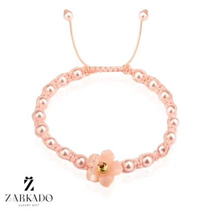 دستبند بافت گل مرواریدی و گوی طلا