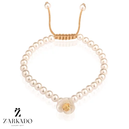 دستبند مرواریدی گل دار و گوی طلا