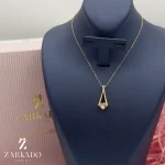 پلاک طلا طرح نگین اتمی تراش قلبی شامپاینی