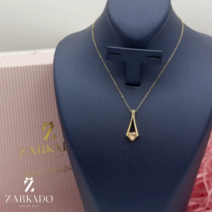 پلاک طلا طرح نگین اتمی تراش قلبی شامپاینی