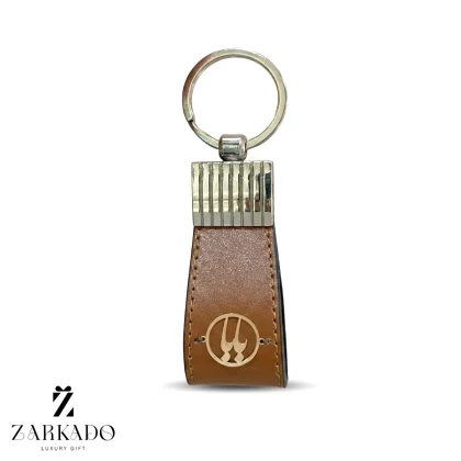 جاسوئیچی چرم عسلی و طلا طرح بابا