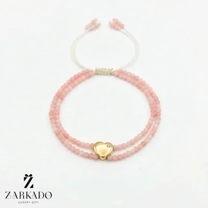 دستبند سنگ صورتی پاستیلی و قلب طلا