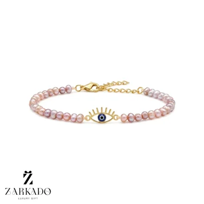 دستبند مروارید پرورشی یاسی و پلاک چشم طلا