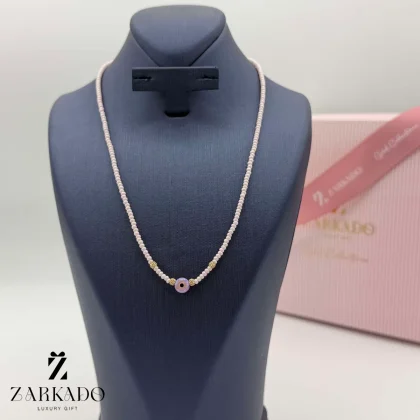 چوکر میوکی صورتی و سنگ اوپال چشم نظر با گوی البرنادو طلا