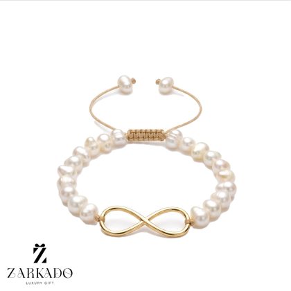 دستبند مروارید پرورشی و طلا طرح بینهایت